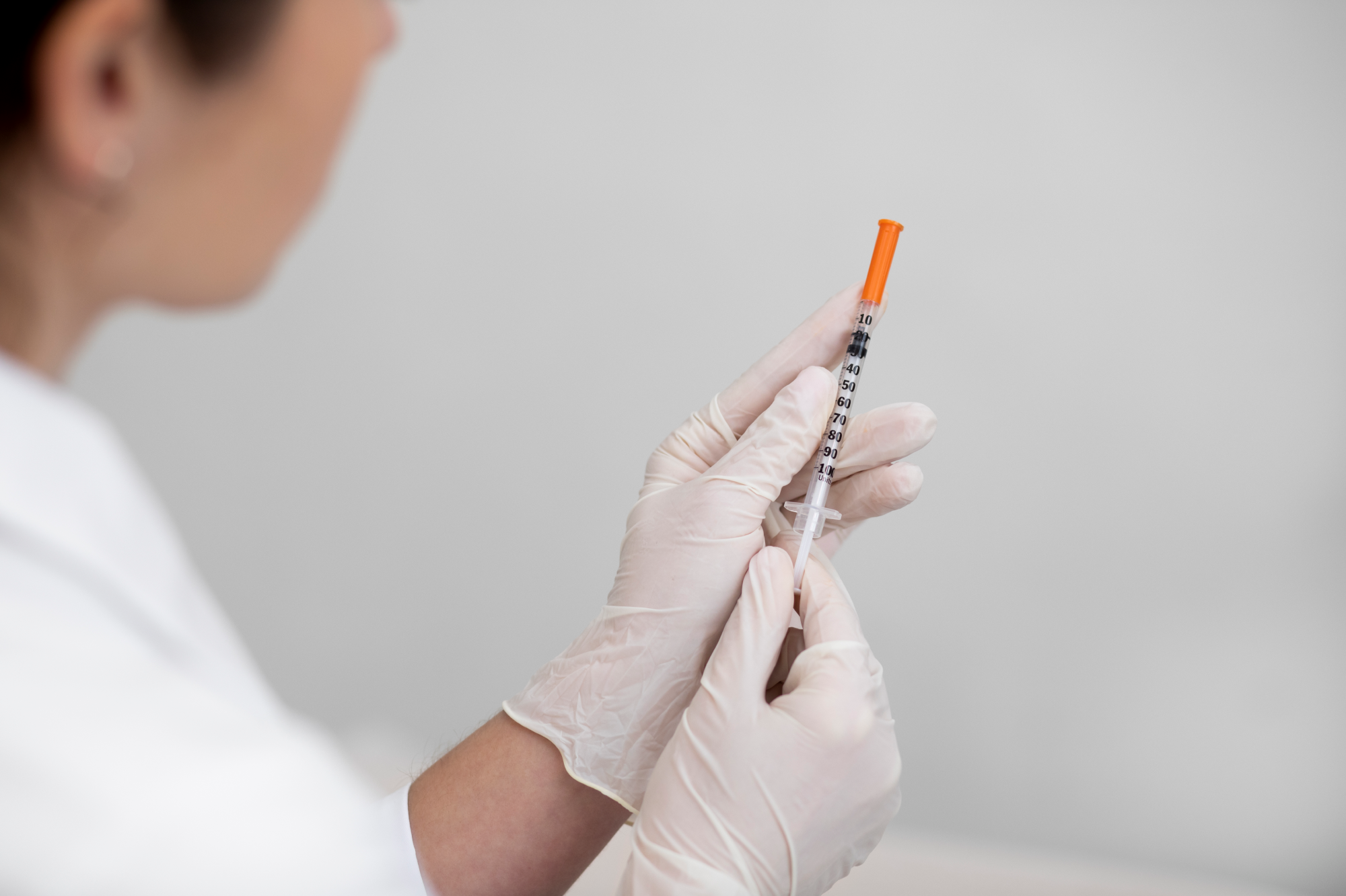 injection being drawn by a doctor