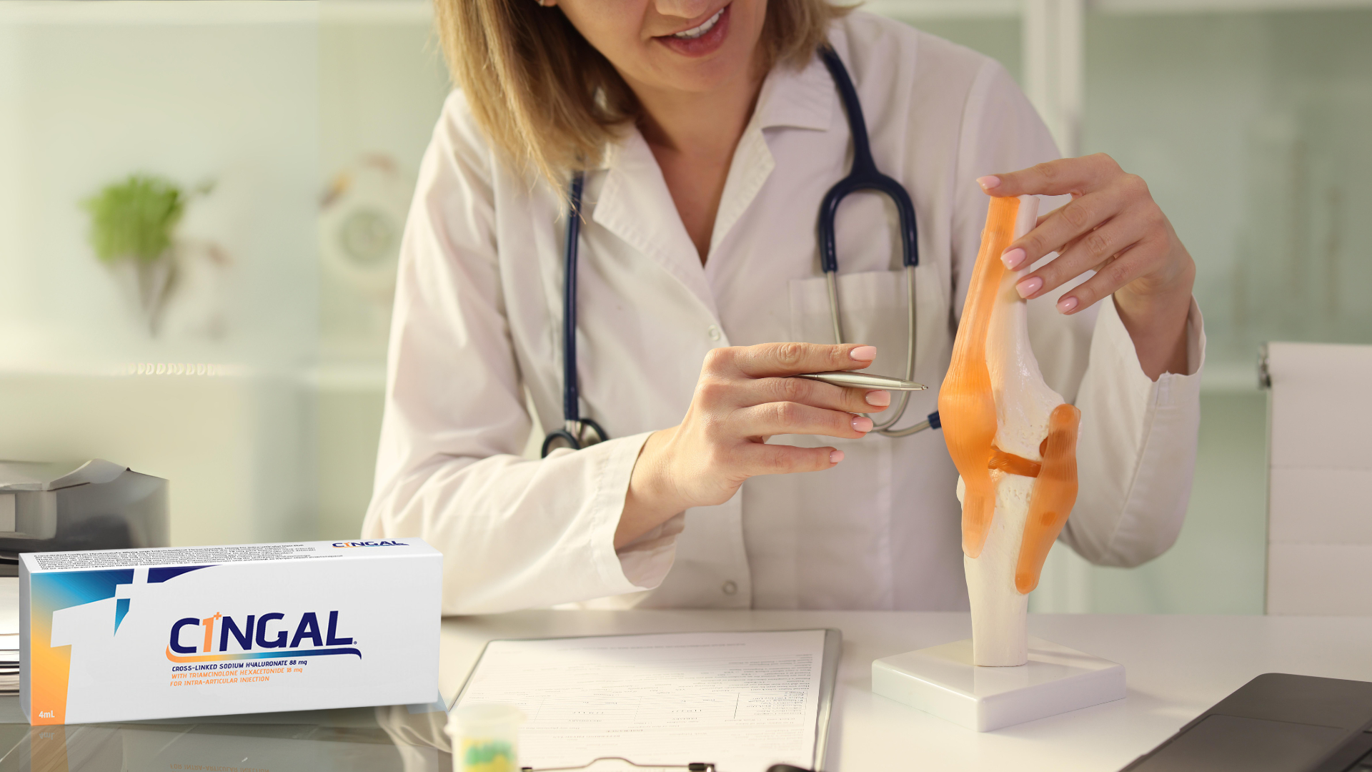 Doctor explaining Cingal treatment's effects for healthy knee joints.