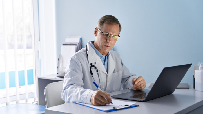 A doctor catalogs the  package of Belotero dermal fillers at their clinic.