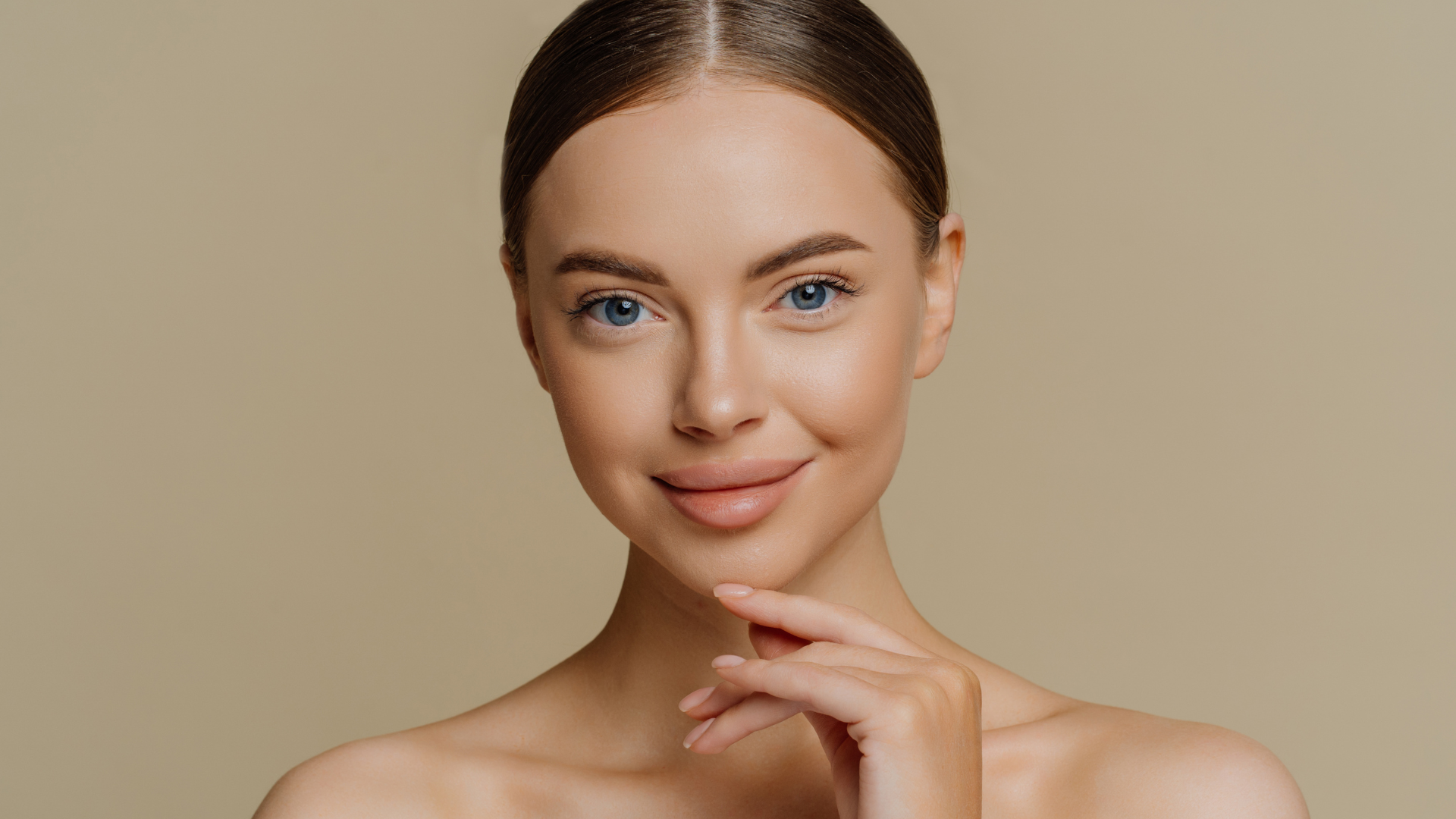 Woman with contoured jawline after Radiesse treatment.