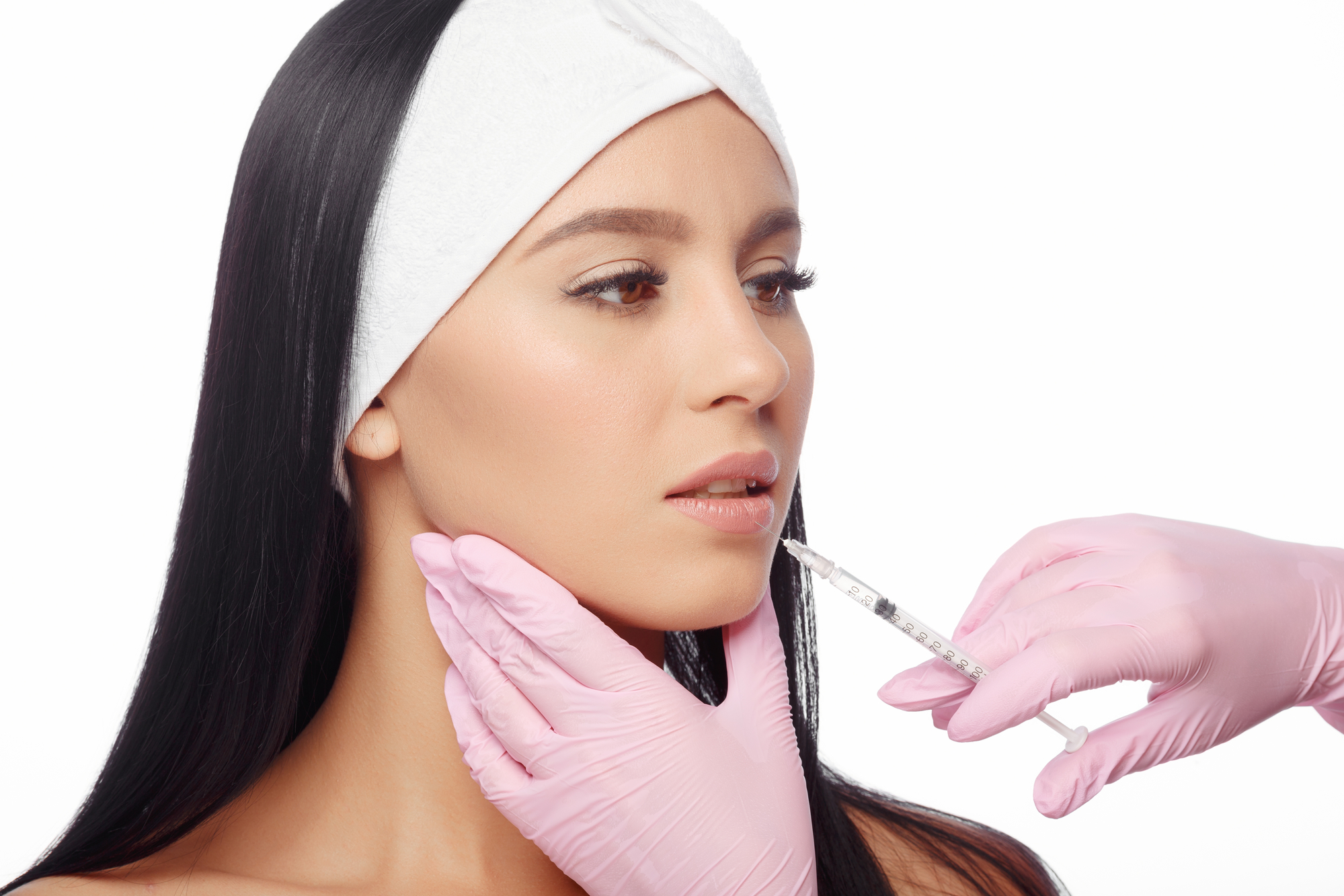 young woman getting natural lip filler injections