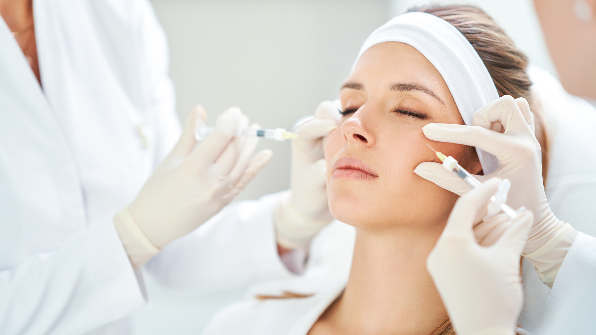 Woman getting facial fillers.