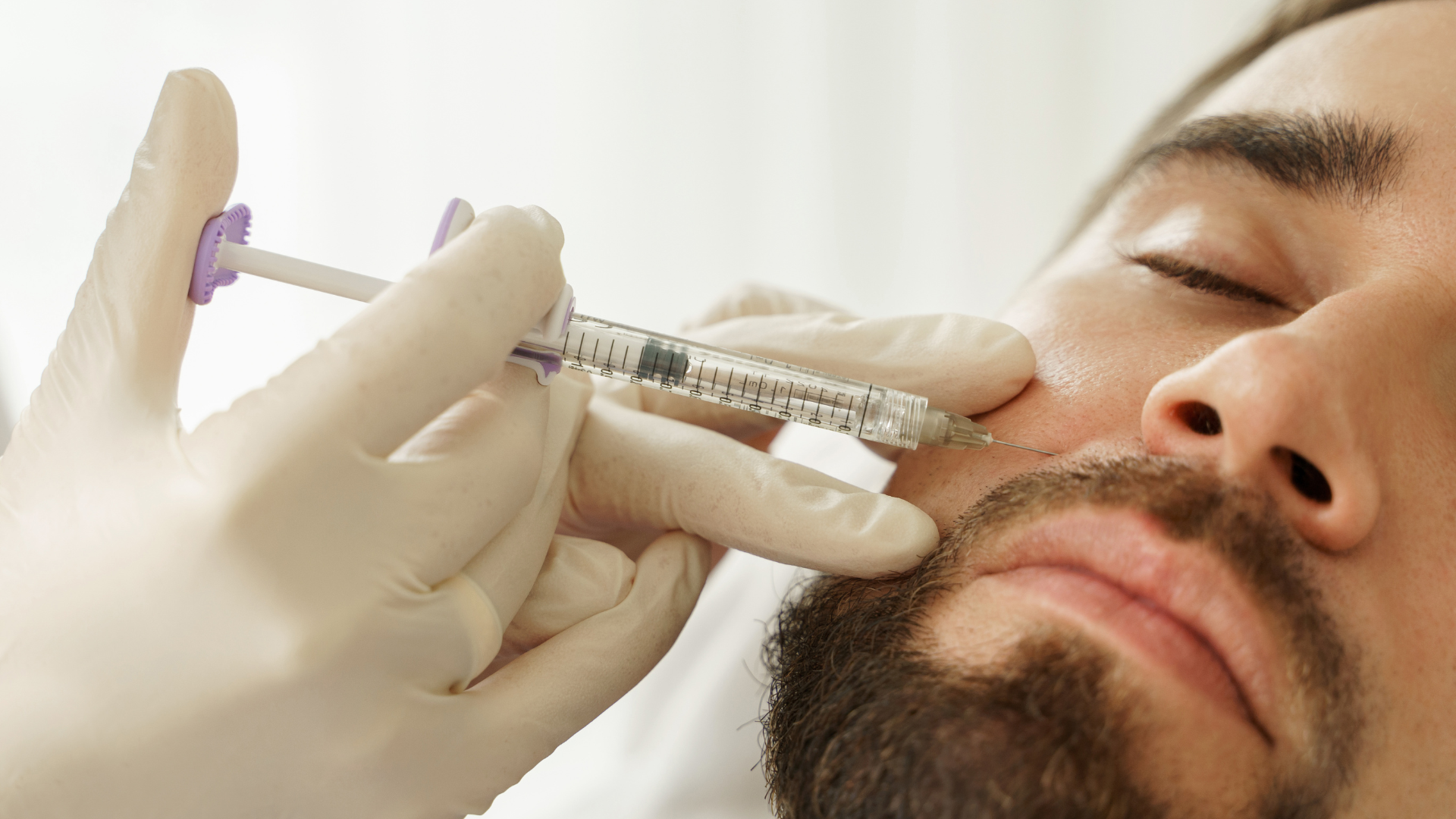 Man getting facial injection.