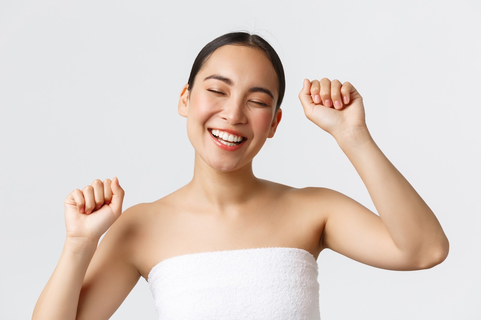 A female patient feels empowered and happy with her improved appearance after receiving Restylane.