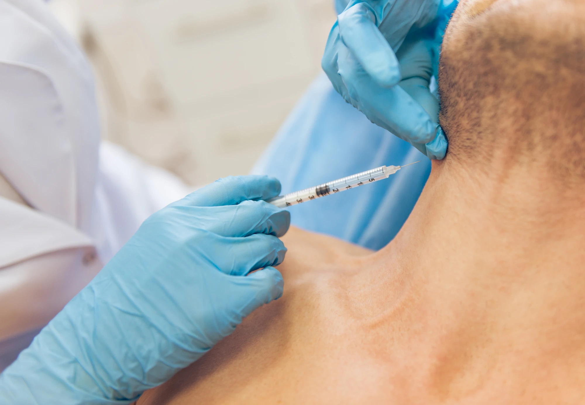 man getting neck filler