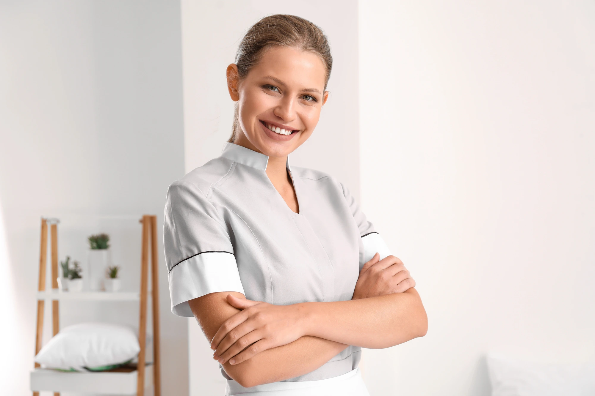 Happy nurse practitioner at her office
