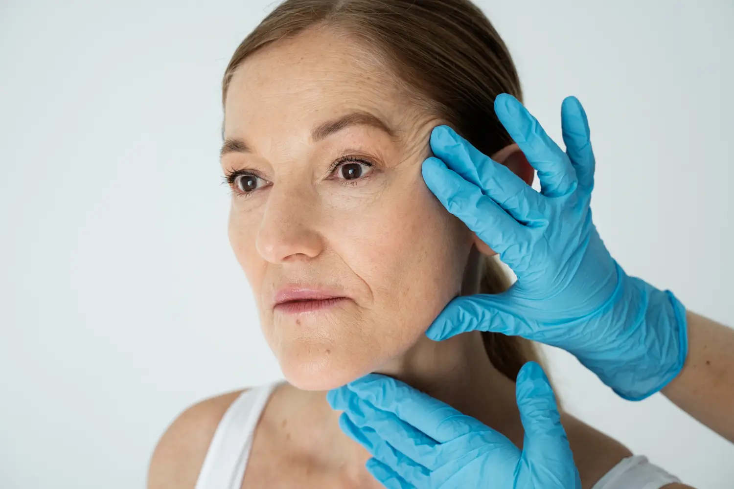 woman's face checked