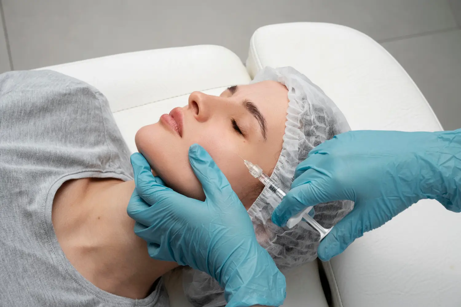 side view of the patient getting cosmetic injection