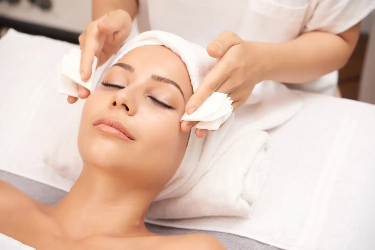 massaging her face