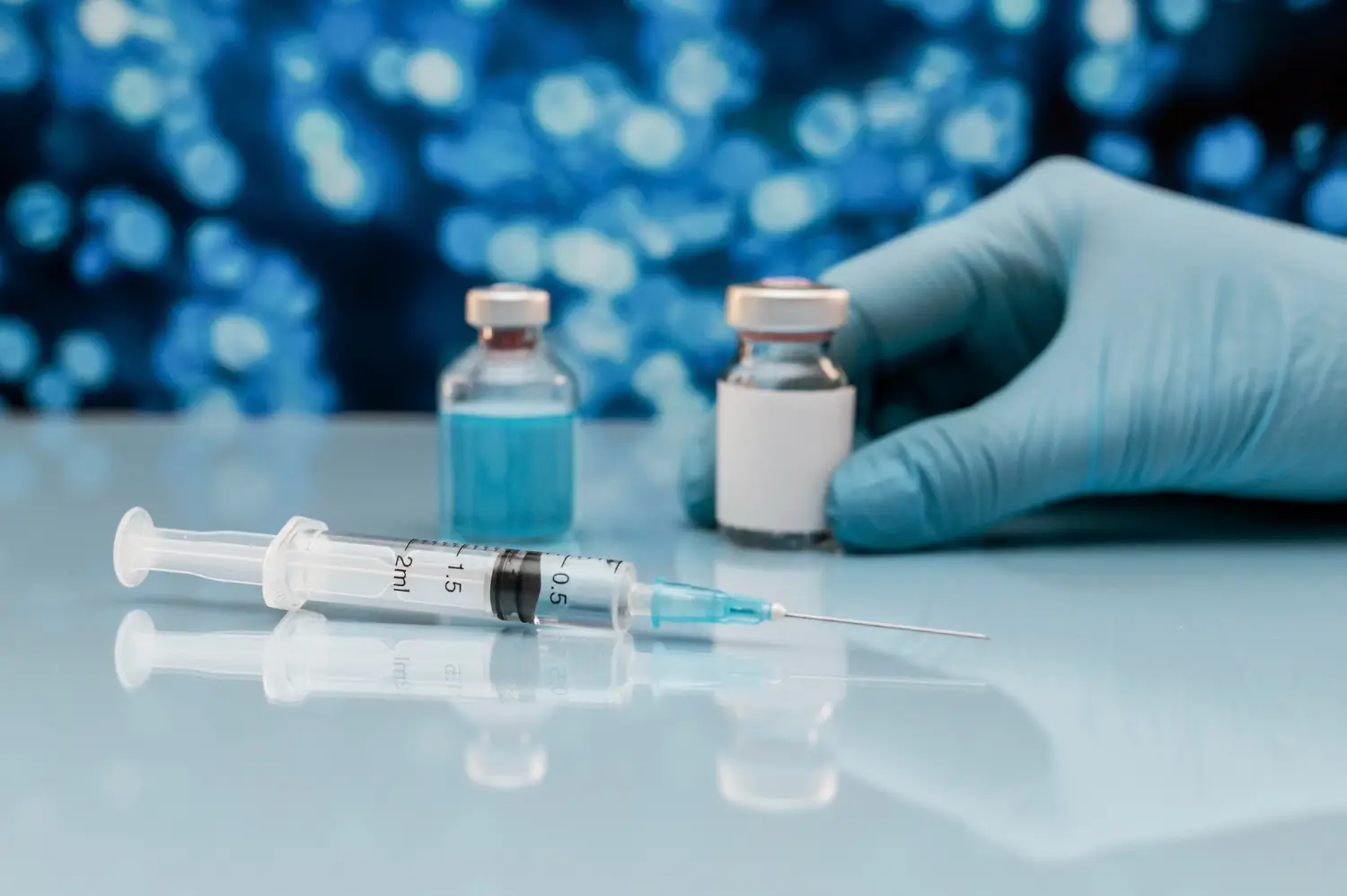 the vial that contains the treatment and the syringe