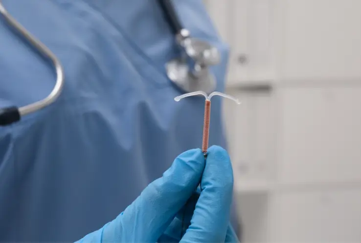 doctor showing the tool before insertion