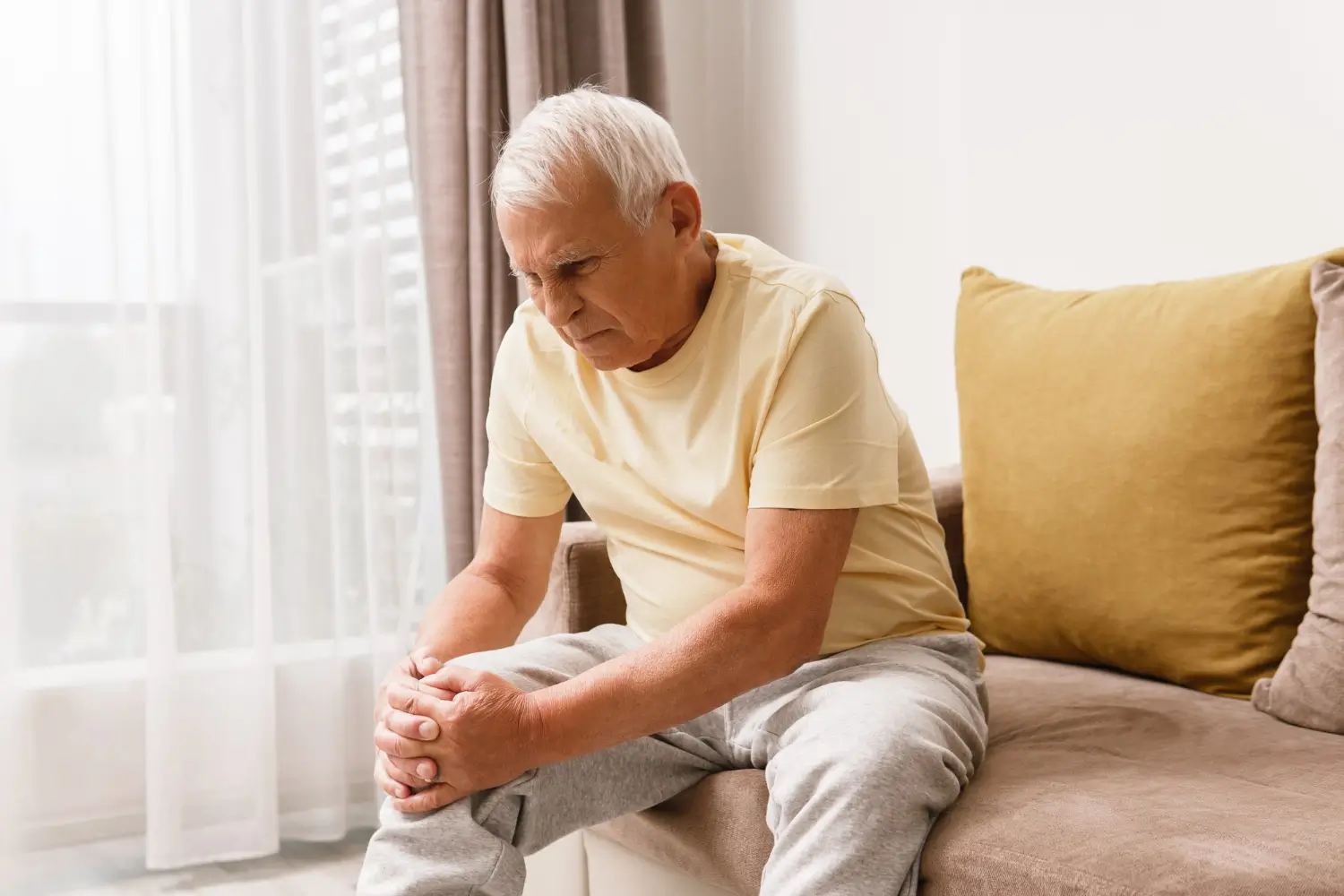 elderly suffering from knee pain