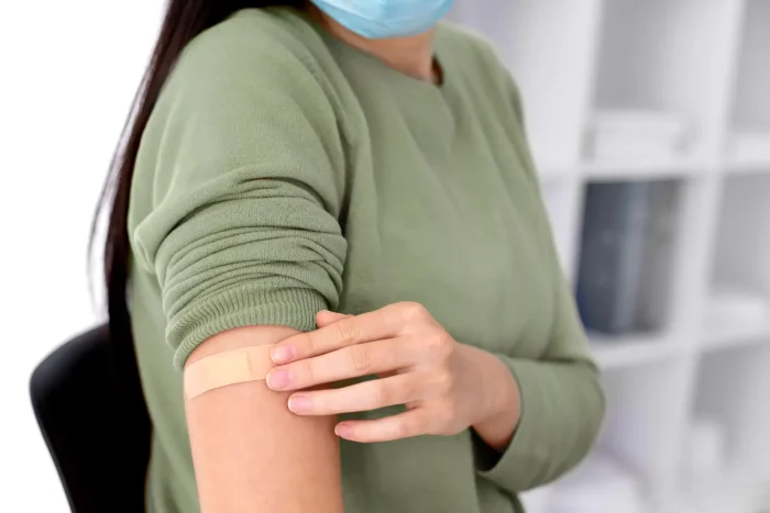 her arm is bandaged