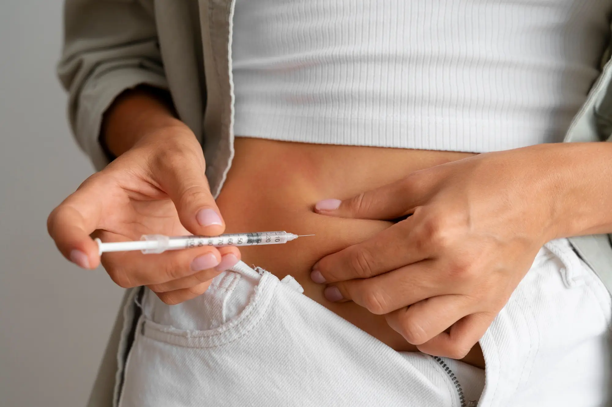 Person self-administering Cimzia in the stomach