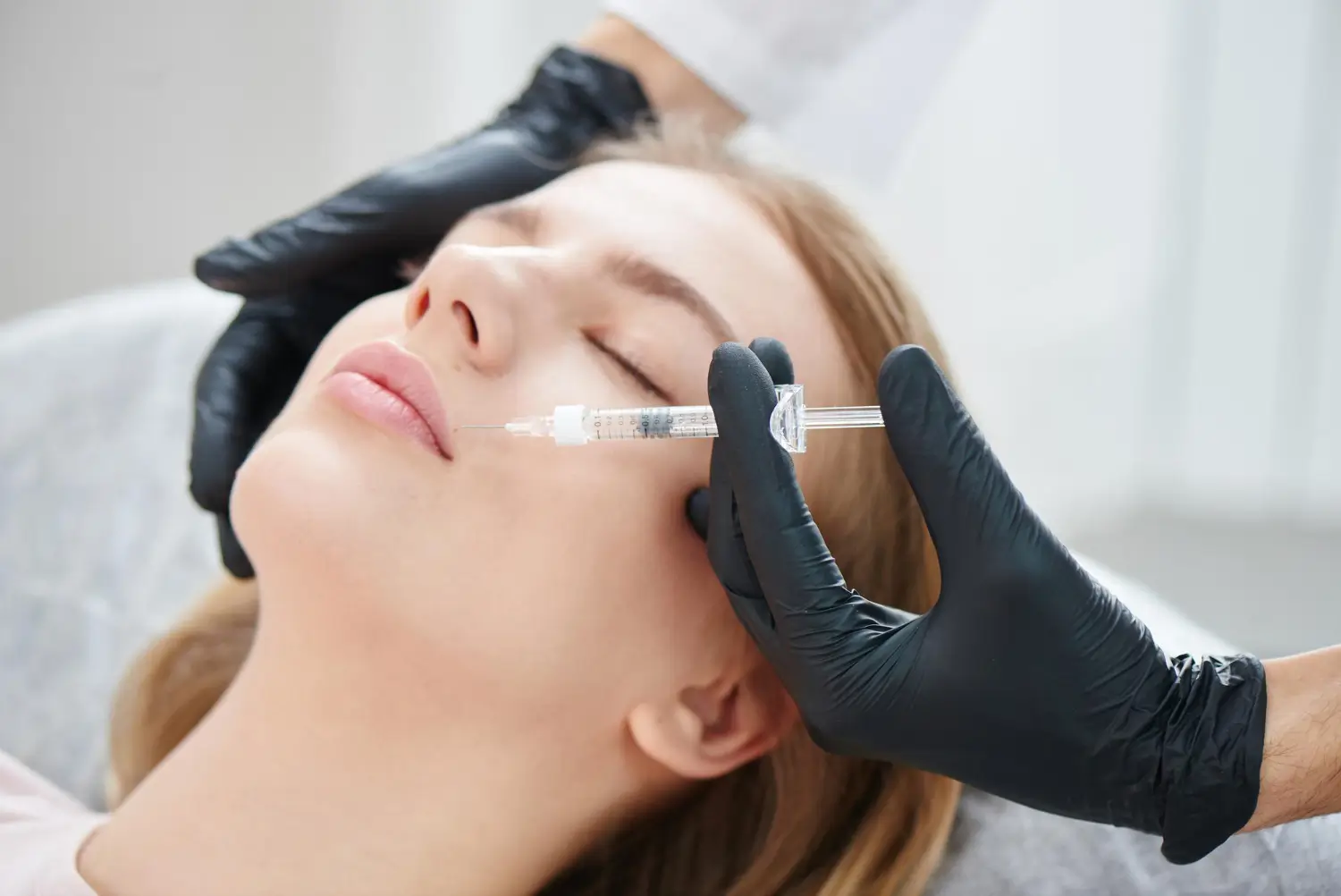 side view of patient getting an injection