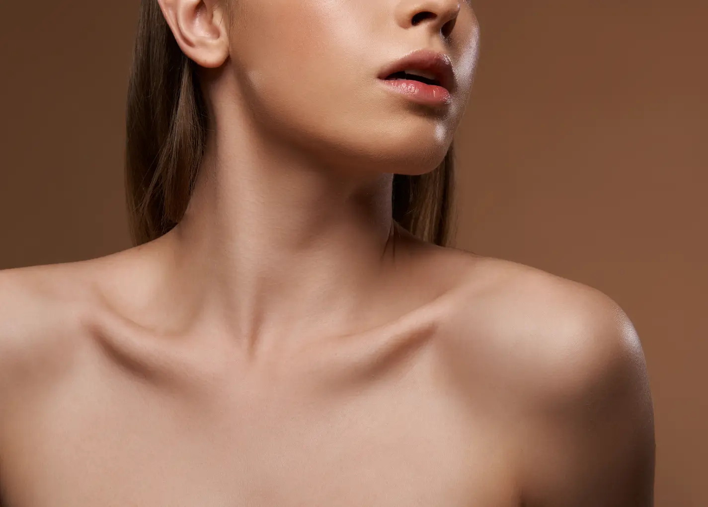 her neck is smooth and wrinkle-free