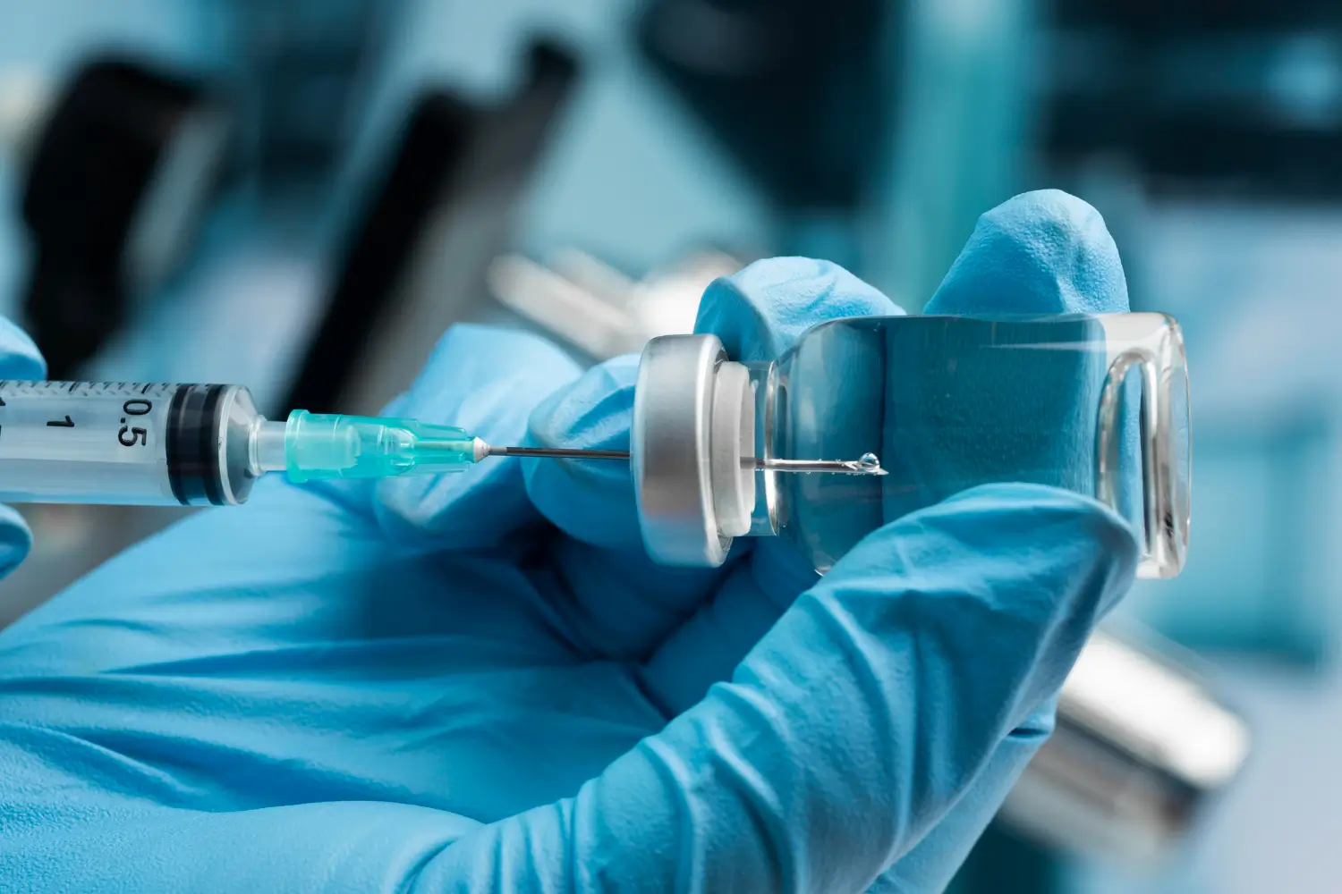injection syringe is being filled with the treatment