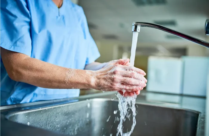 washing his hands