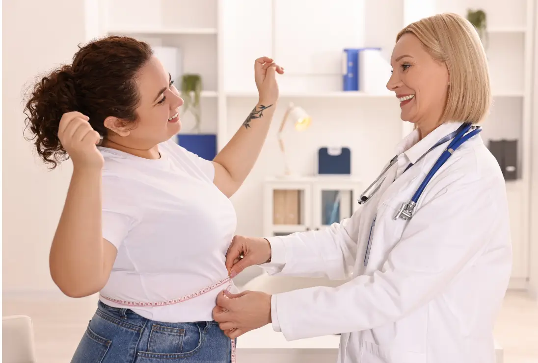 Woman gets her weight checked by a specialist after taking meds.