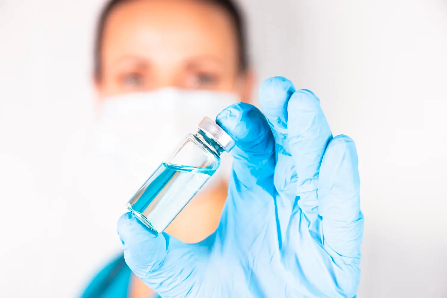 showing the injectable on a vial