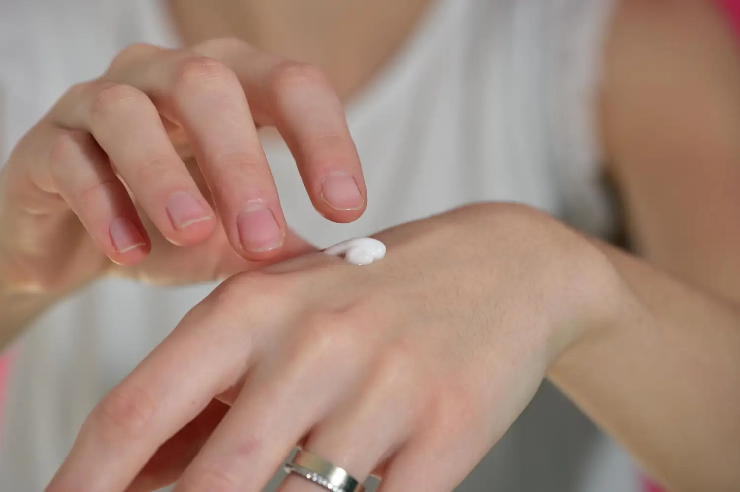 gently putting the cream