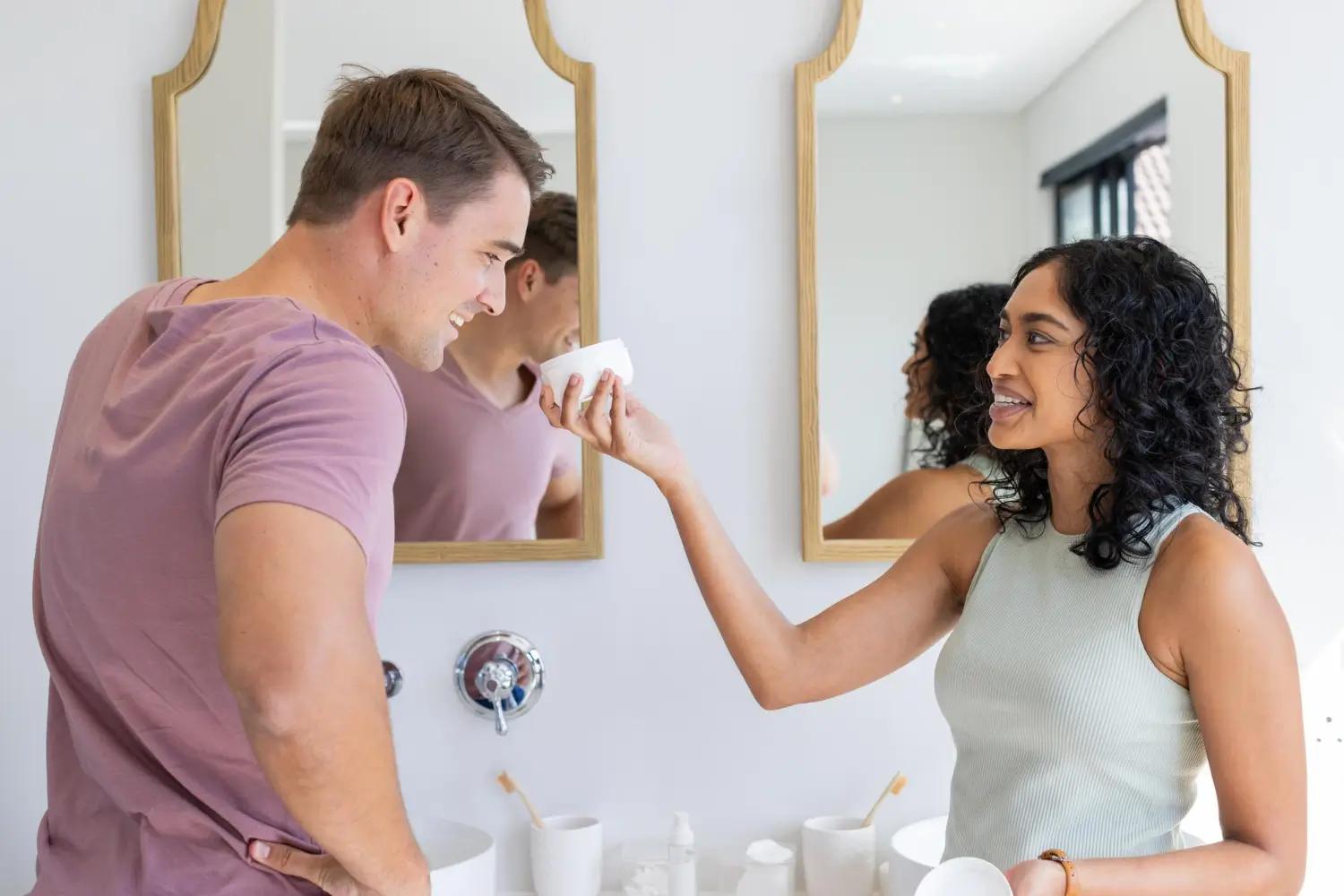 couple sharing creams to each other