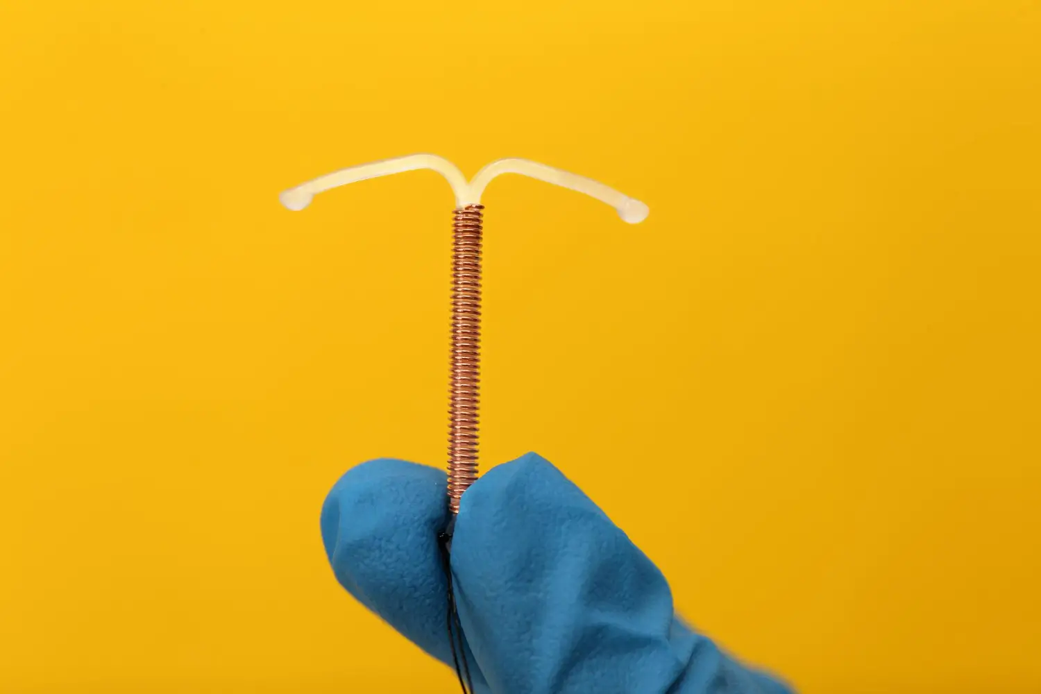 holding the device to be inserted for contraception