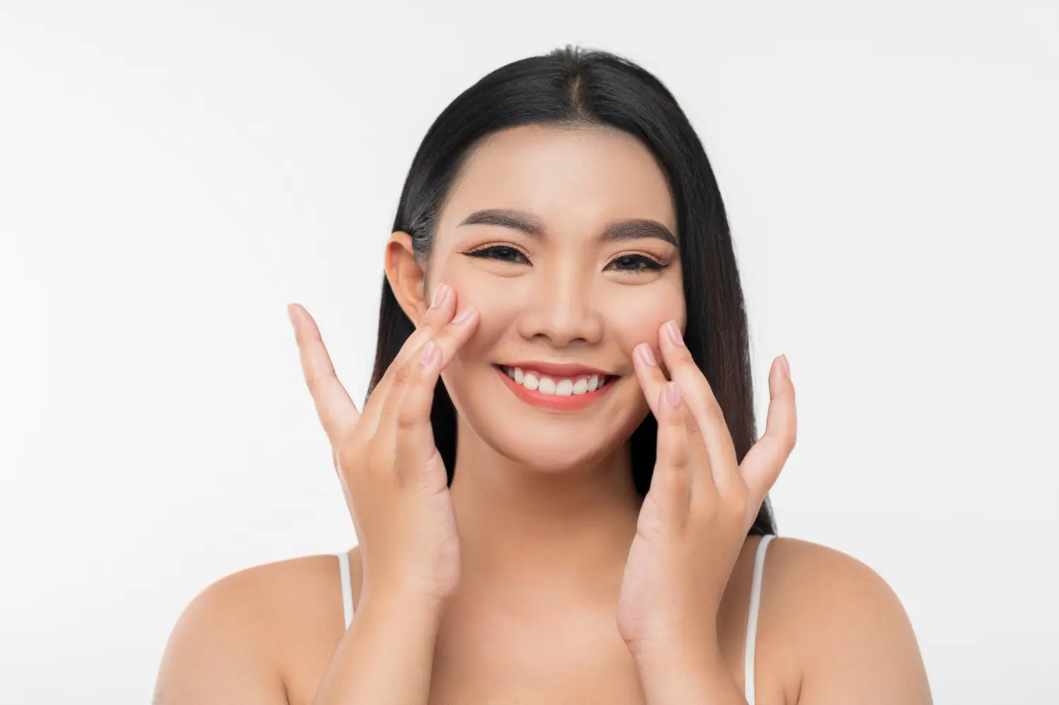 Woman enjoys the result of her recent botulinum toxin injection, like Dysport, to eliminate wrinkles.